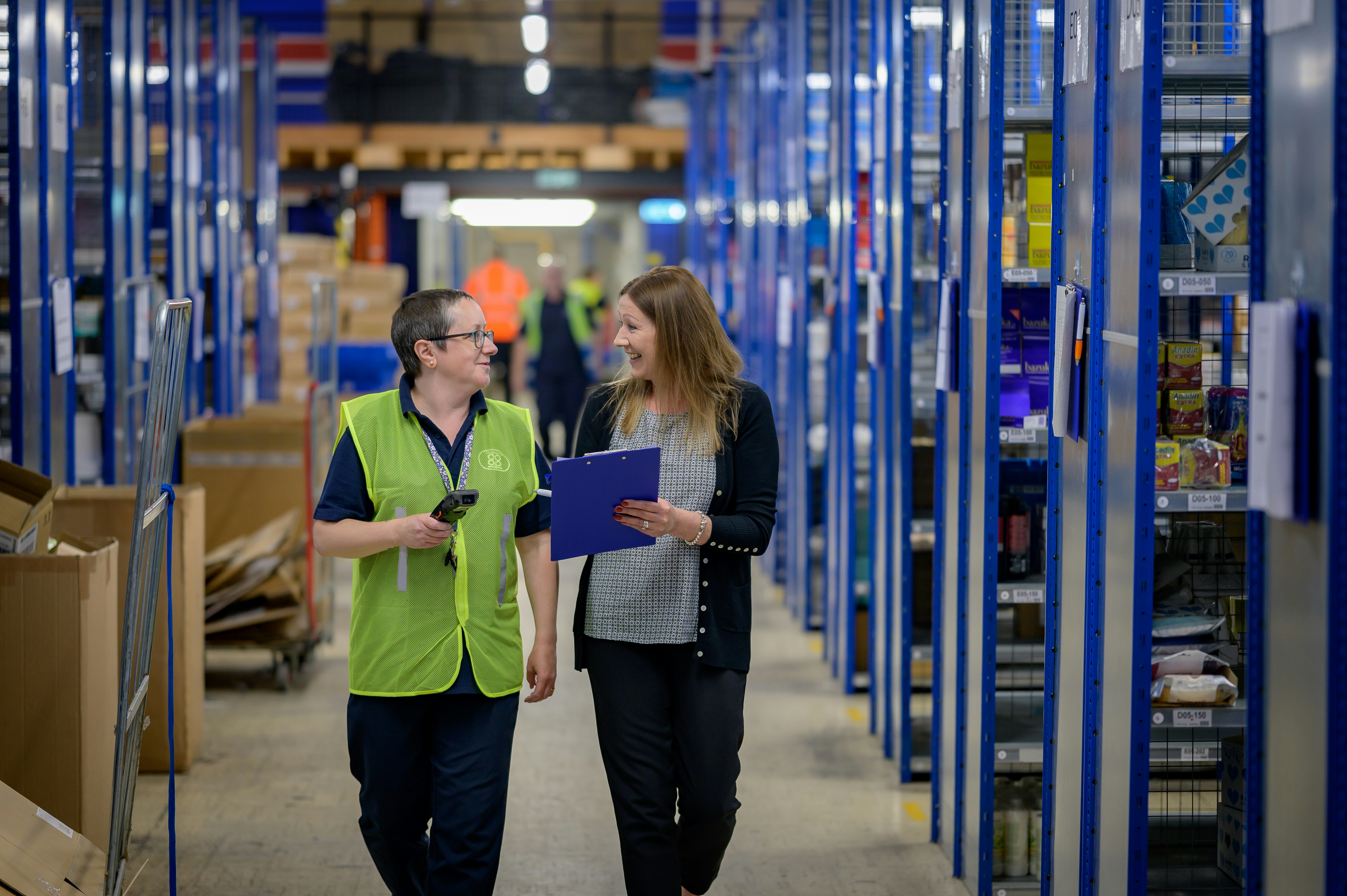SwiftKart Courier & Logistics team delivering for businesses